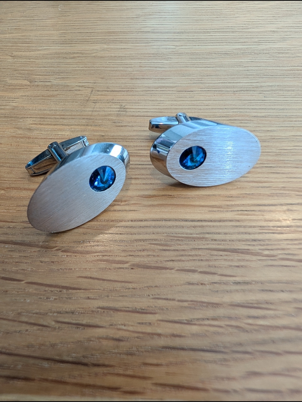 Vintage Brushed Silver Oval Cufflinks with Blue Crystal Accent By Sarah Coventry